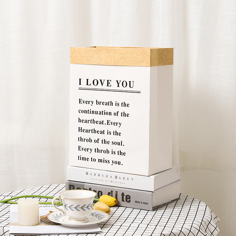Picture of Flower packaging bag ins style bouquet bag rectangular gift bag kraft paper bag net red English hug bag wholesale