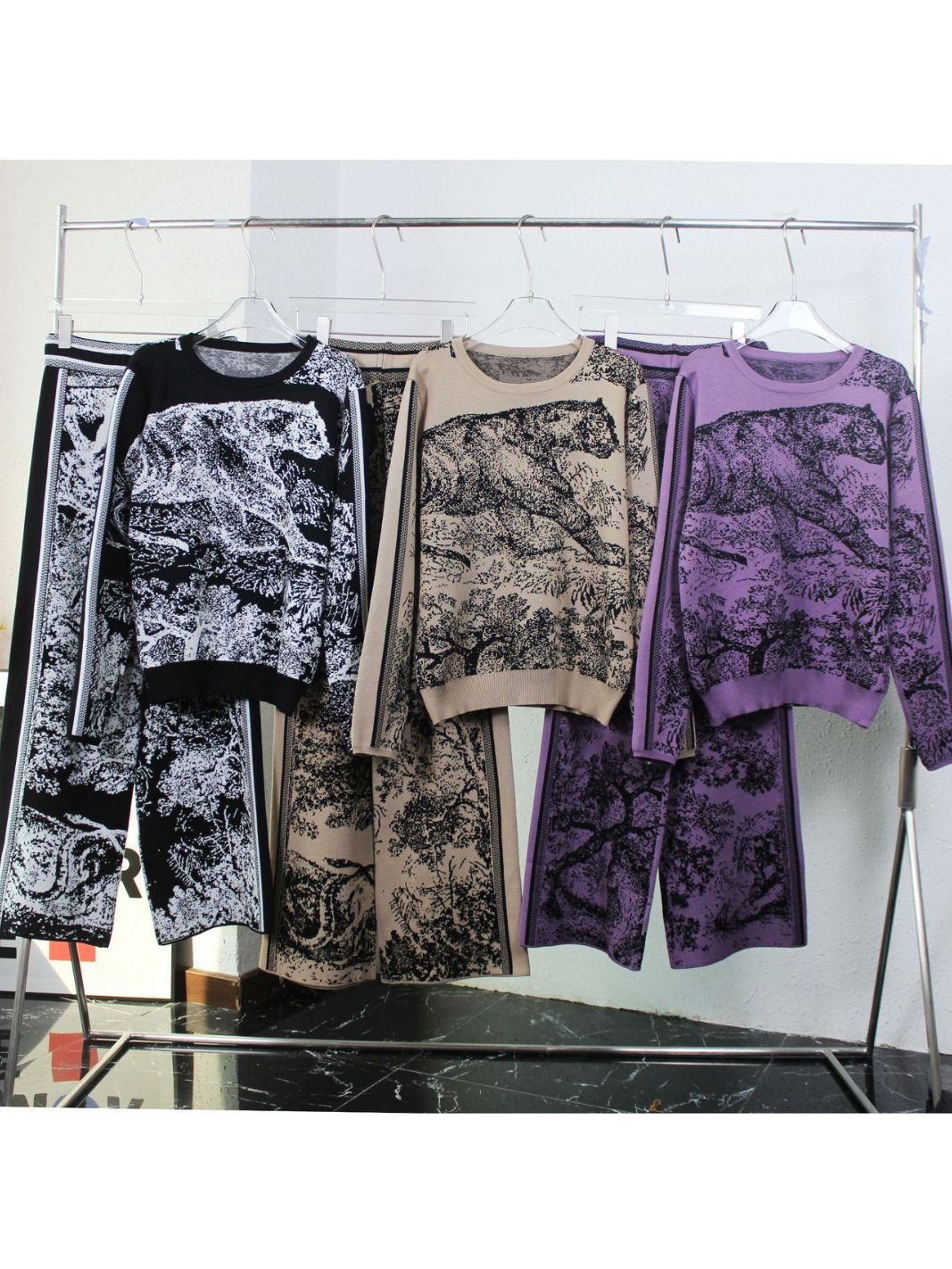 Cross-border autumn and winter tiger print European and American knitted suit round neck long sleeve sweater loose wide leg pants two pieces suit