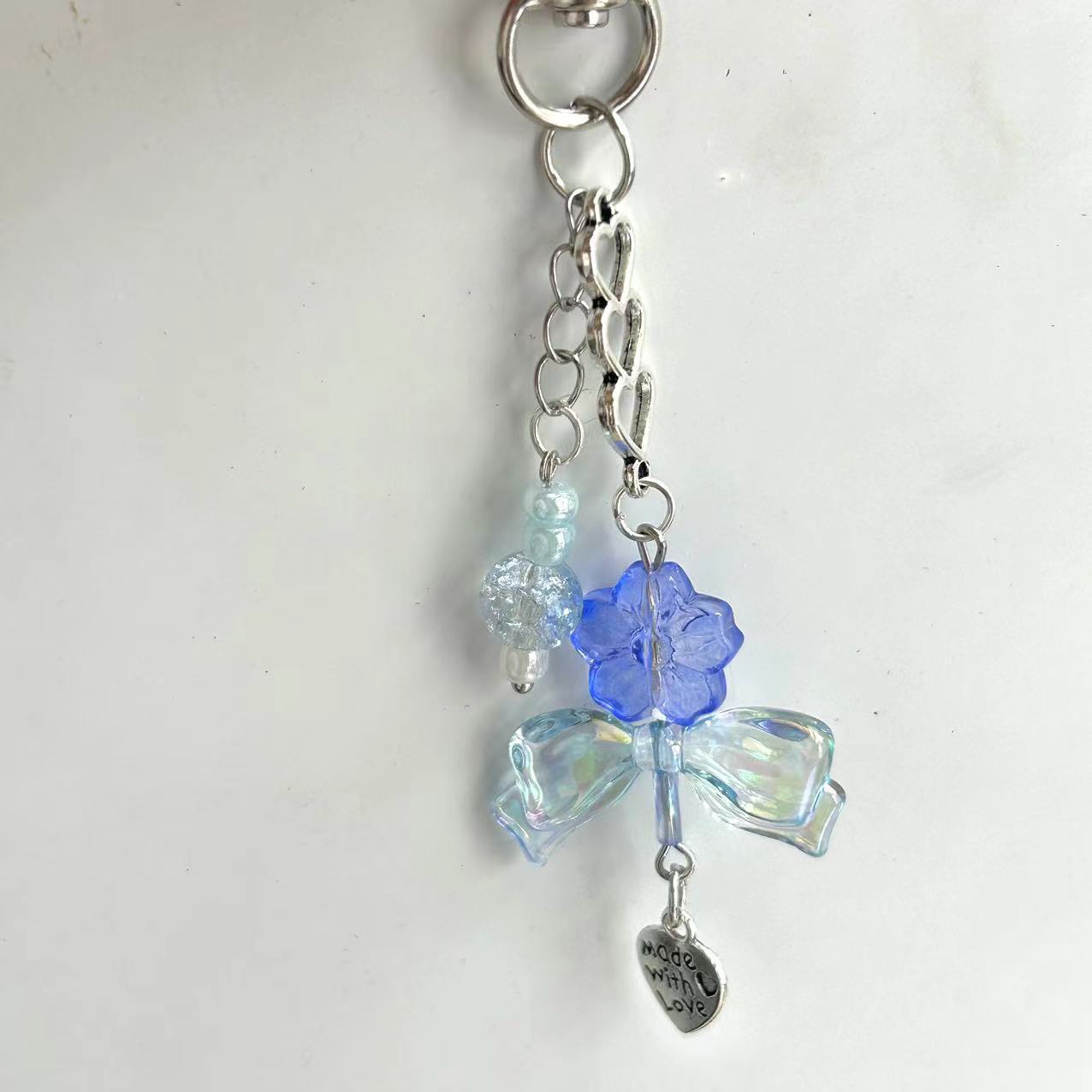 Picture of Original ice blue flower bag buckle pendant hand-made beaded girl heart ice blue key chain pendant