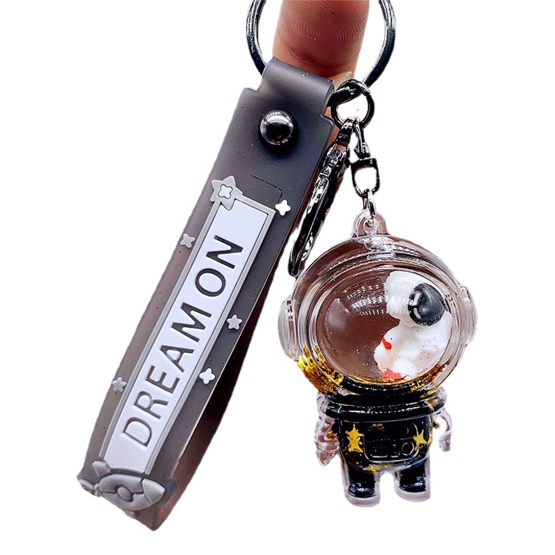 Black Gold Oil-Filled Astronaut Pendant Cartoon Cute Keychain Car Accessory Bag Astronaut Creative Holiday Gift