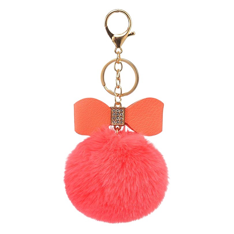 Factory wholesale supply of cross-border 8cm imitation Rex rabbit bow fur ball keychain creative gift bag pendant