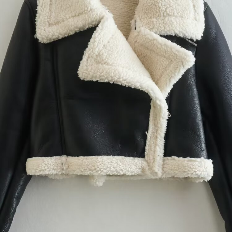 Picture of 2024 autumn and winter new European and American style double-sided loose short PU leather jacket zipper decoration fur one-piece leather jacket