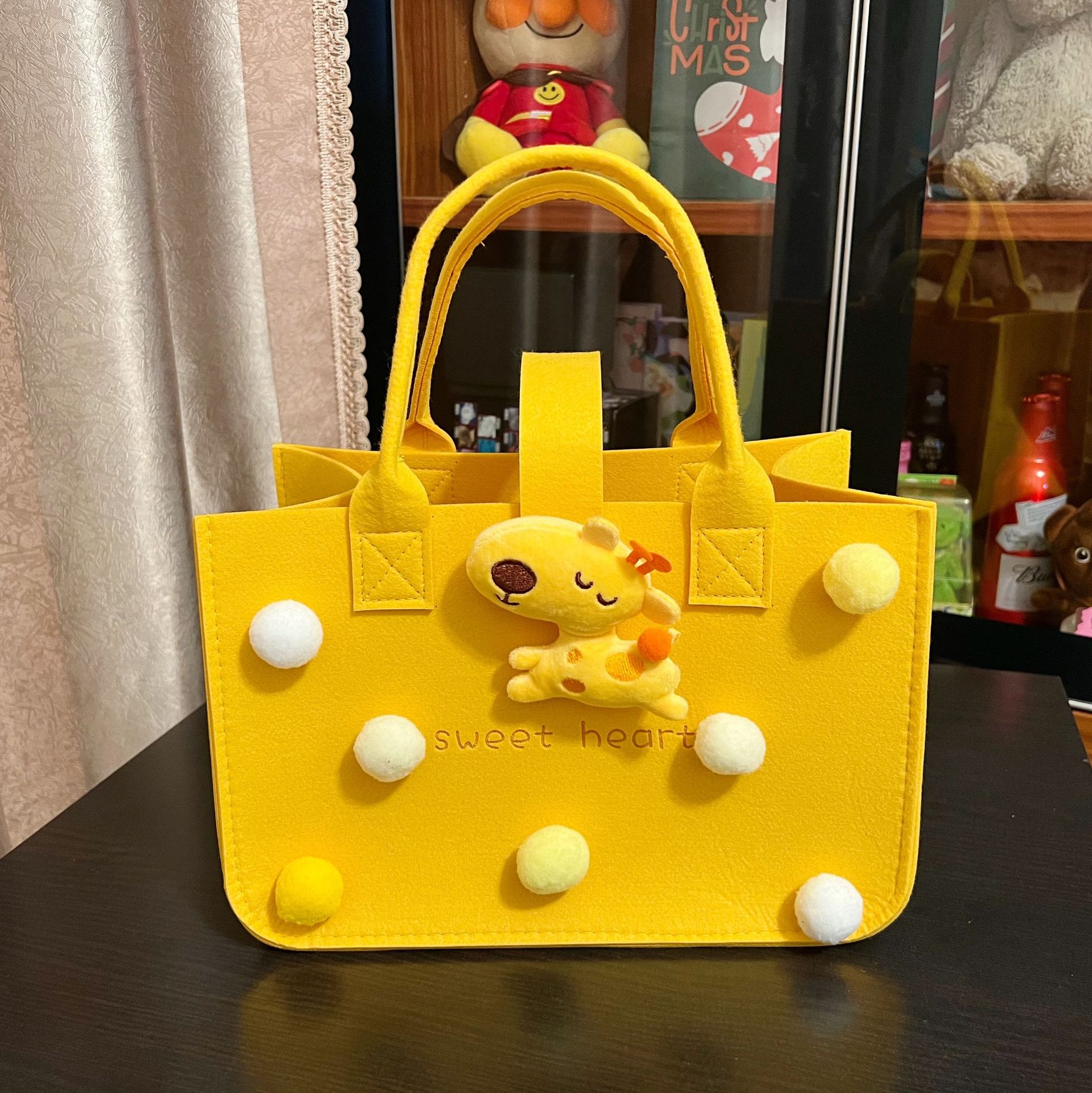 Picture of 2022 felt cartoon handbag hand bag gift bag Net Red full moon wine birthday gift bag wholesale