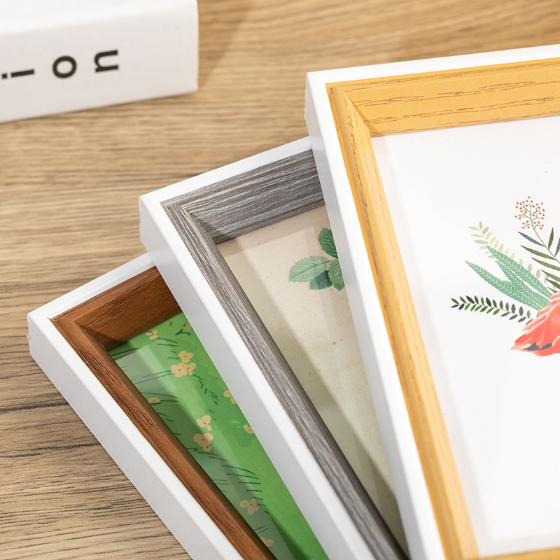 Picture of Cross-border creative solid wood picture frame 6 inch a4 photo frame table advanced sense wooden handmade DIY living room decorative wall frame
