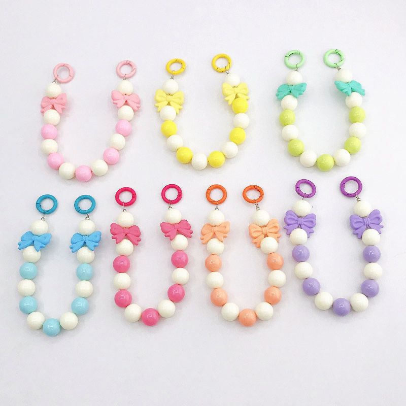 Picture of New Candy Color Acrylic Hand Chain Colorful Bow Bag Pendant Diy Mobile Phone Case Accessories Trend