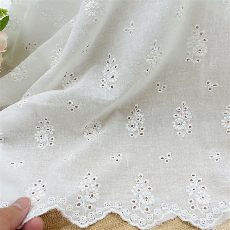 New Cotton hollow embroidered cloth white cotton bilateral embroidered clothing dress lace embroidered fabric