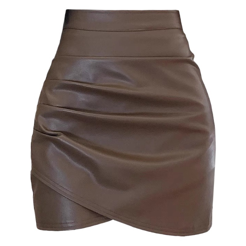 2023pu leather skirt women's autumn and winter hot girl high waist irregular skirt sexy pleated tight hip skirt