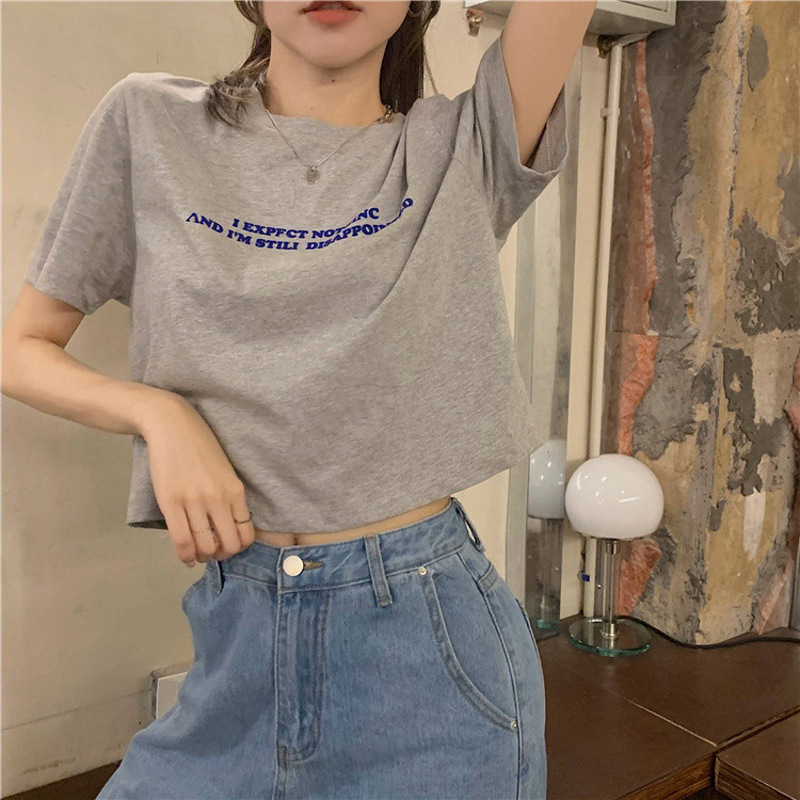 Korean version of the new loose short care machine exposed letters printed short sleeve T-shirt top women a generation of hair