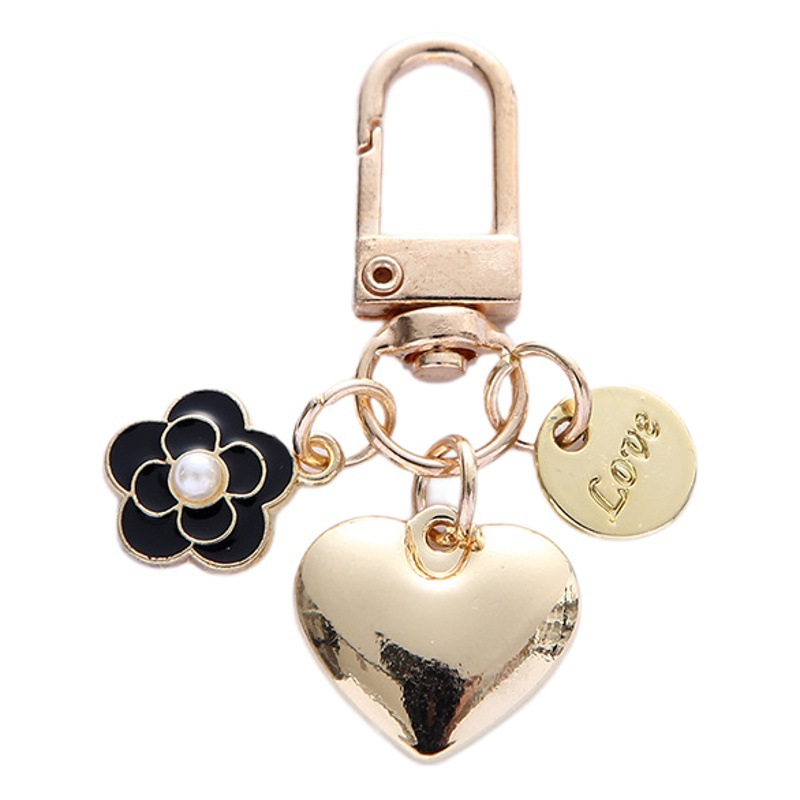 In stock wholesale Metal Love keychain cute Camellia letter round card metal accessories earphone case bag decoration