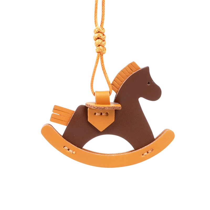 Picture of Factory wholesale rocking horse pendant bag decorative leather handmade pony pendant car pendant cowhide material bag