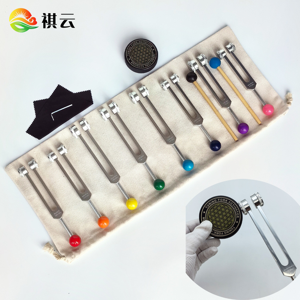 Eight suit tuning forks 126.22 136.1 141.27 172.06 194.18 activation block with massage ball