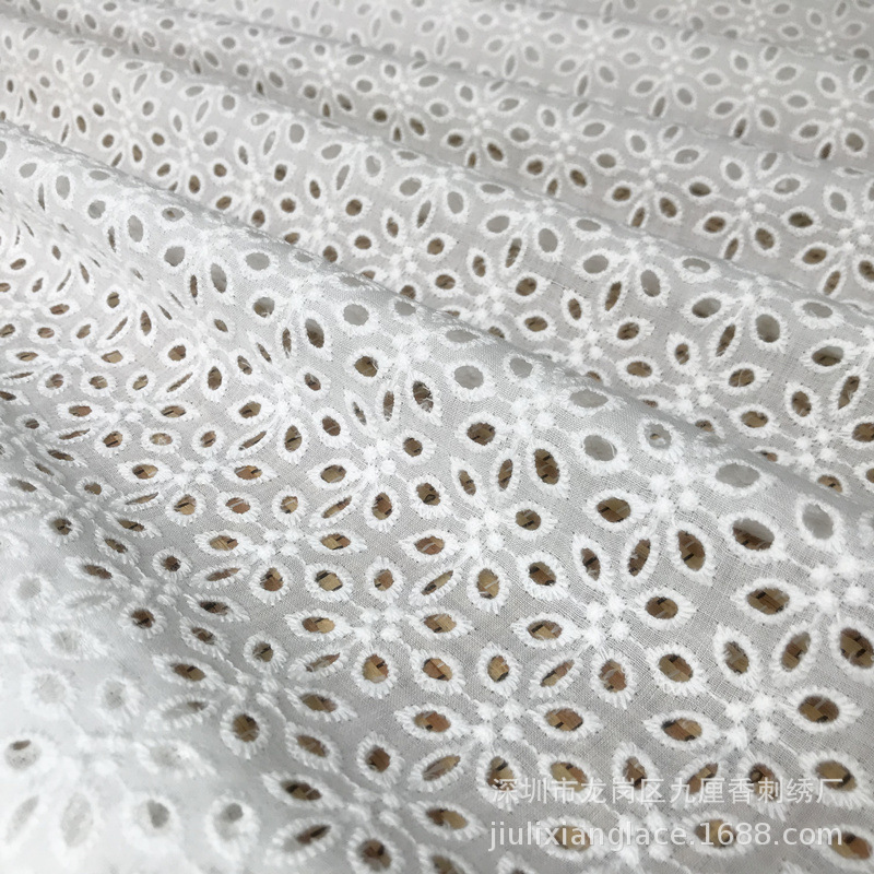 Spot factory direct hollow full computer embroidery cotton jacquard fabric shirt material for spring, summer and autumn