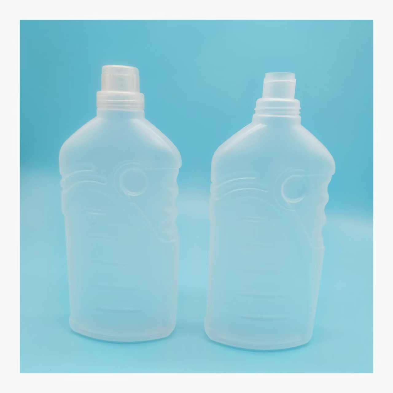 Open natural color transparent PP, PE1000ml plastic bottle floor tile floor cleaner packaging blow molding factory
