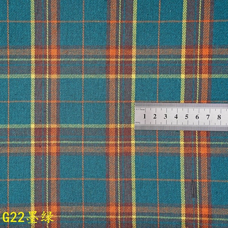 Picture of 140g Yarn-Dyed Plaid Woolen Fabric in Stock Wholesale 21S Yarn-Dyed Twill Brushed Plaid Shirt Fabric Ins Flannel