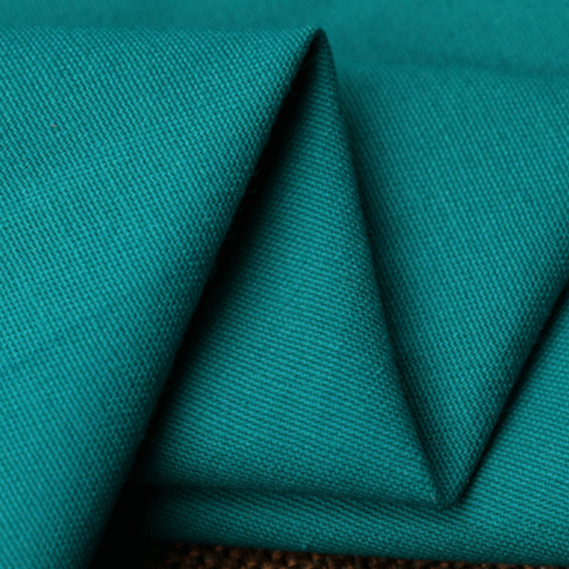 Spring and autumn cotton rough edge elastic yarn card fabric reactive printing and dyeing plain fabric overalls clothing textile fabric