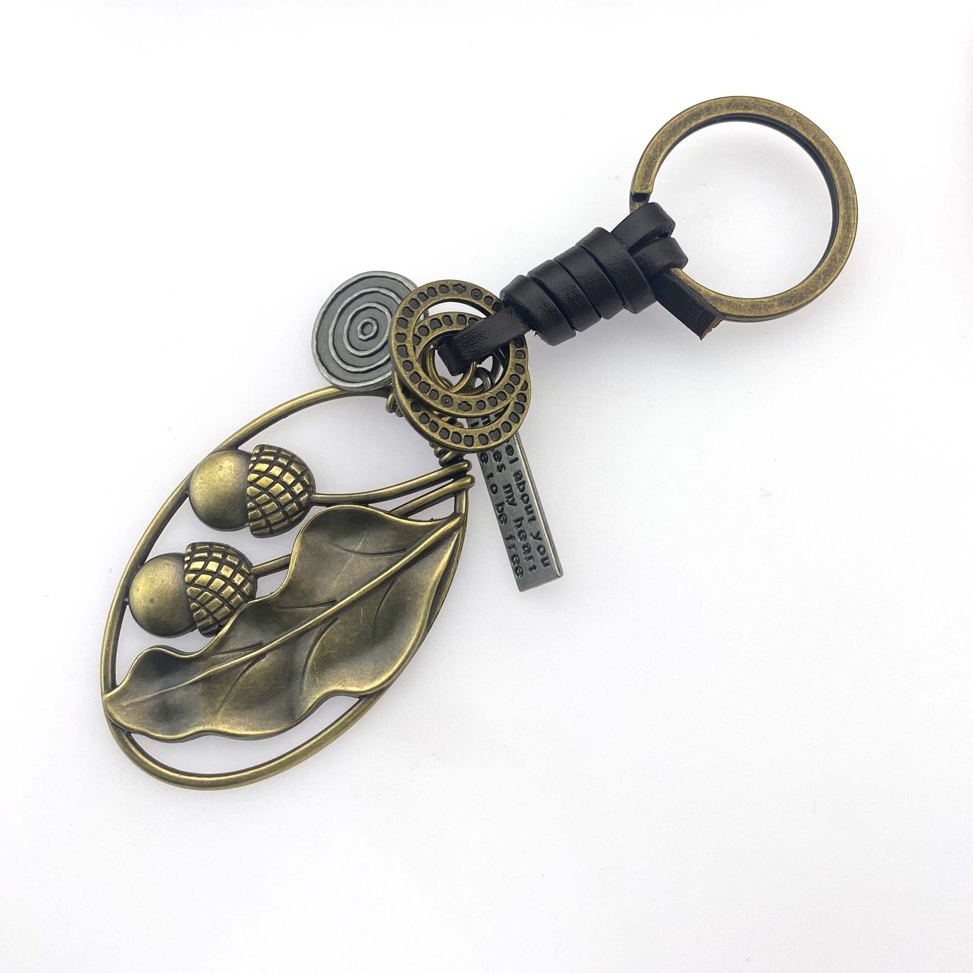 Picture of Cross-border New Hand-woven Retro Kraft Fruit Cotyledon Keychain Tourist Area Gift Gift Bag Hanging Ornaments