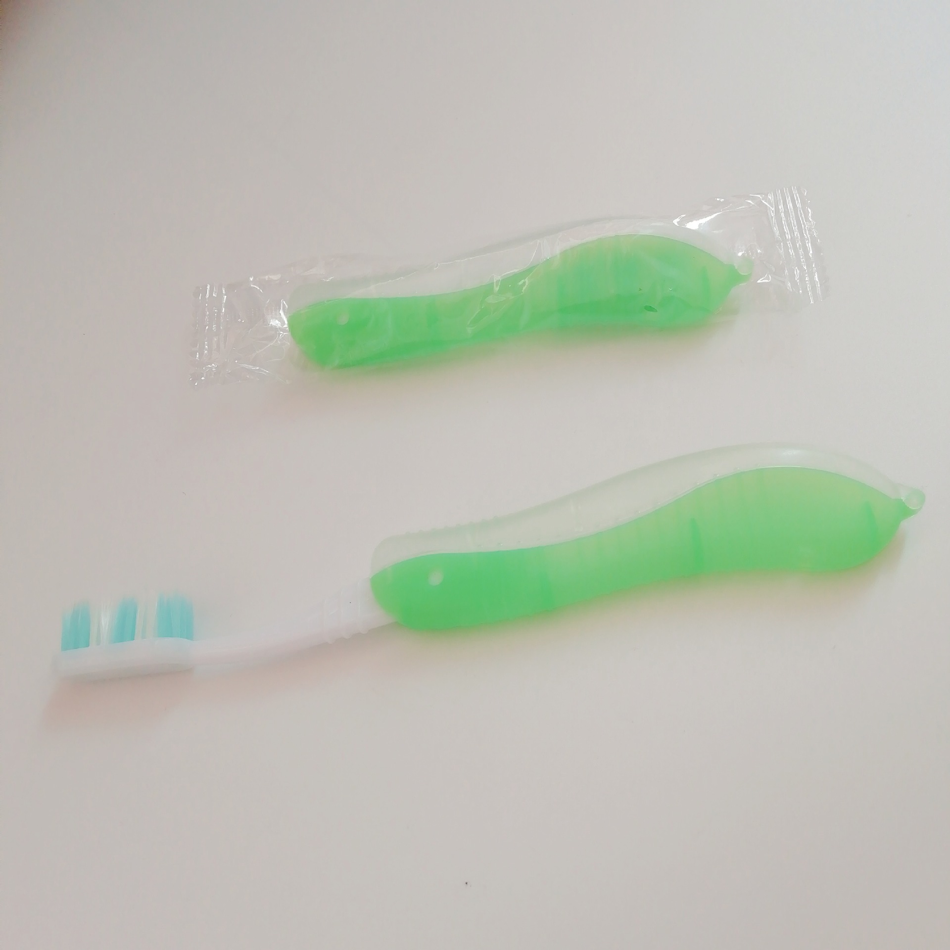 Picture of Folding Toothbrush Outdoor Travel Adult Personalized Portable Storage Sleeve Scrub Soft Hair Group Building Gift Advertising Toothbrush