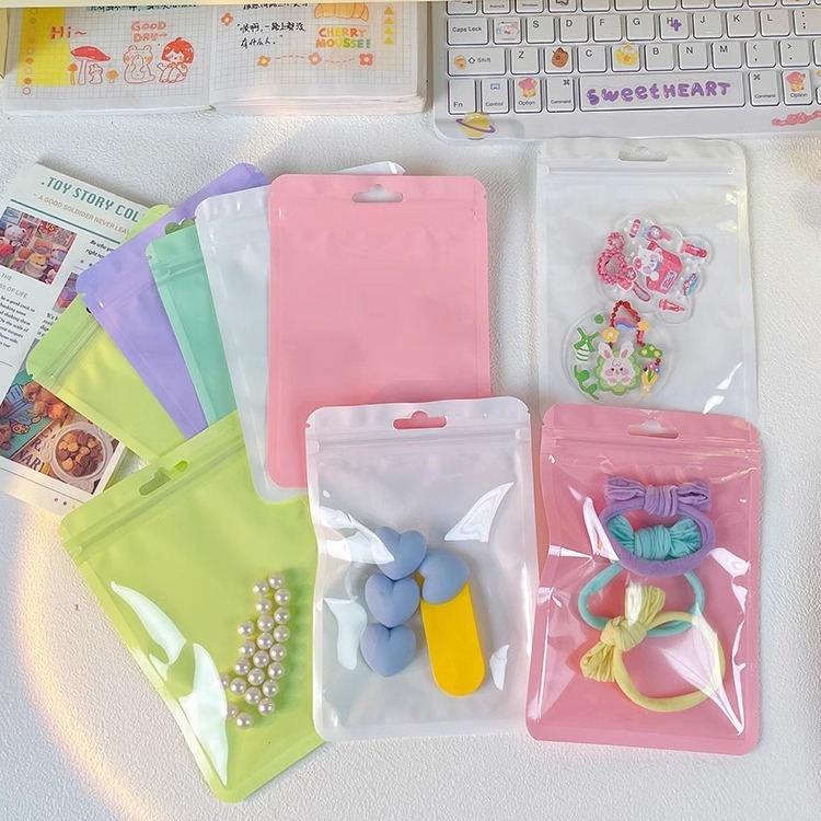 Macaron color self-sealing bag holographic bag thickened transparent color bone bag jewelry sealed pocket makeup brush packaging bag
