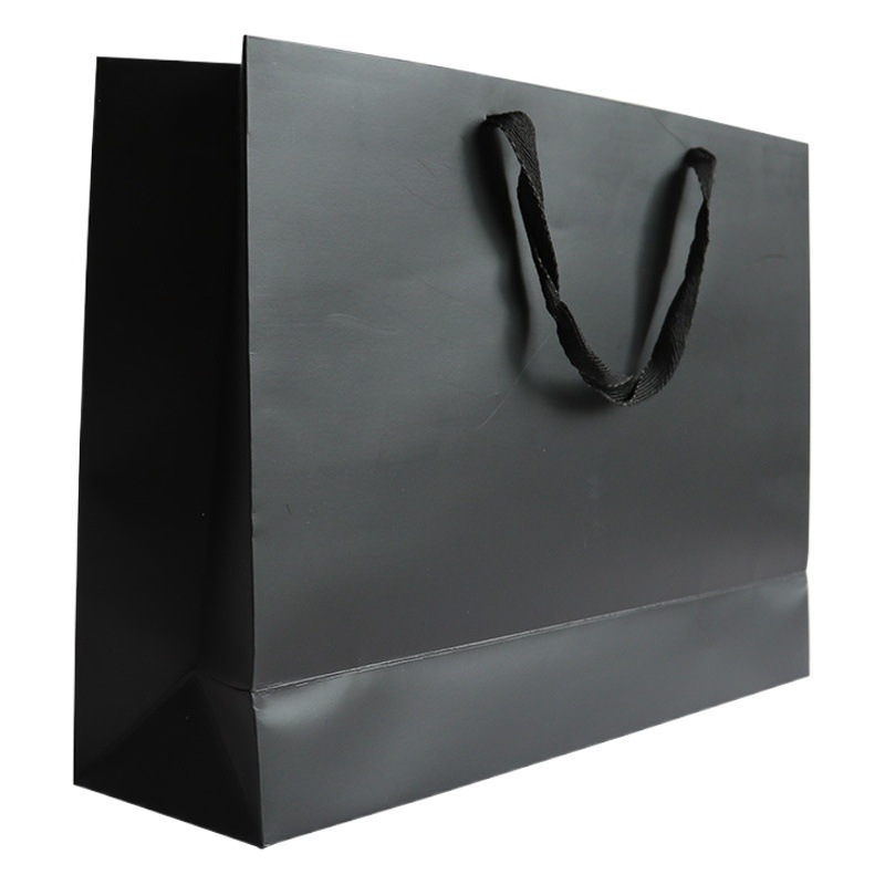 Wholesale black paper bag spot clothing store handbag thickened gift bag packaging bag coated waterproof hand bag