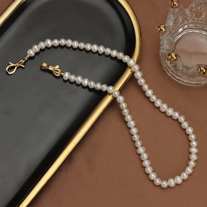 Picture of Spot Wholesale Natural Freshwater Pearl Necklace Ins Design Clavicle Chain New Niche Accessible Luxury Bow Buckle