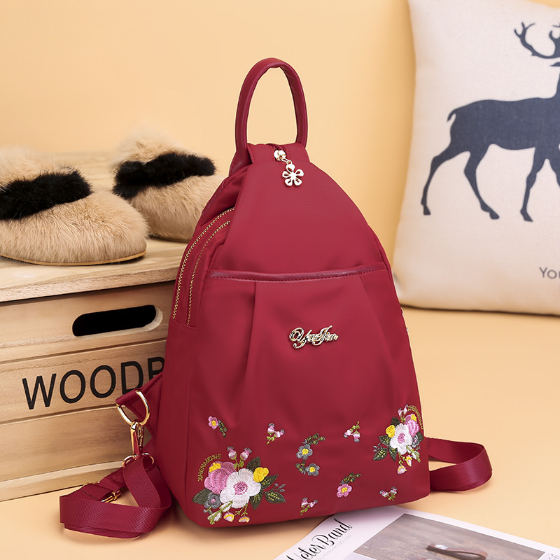 Picture of Oxford Cloth Embroidered Backpack Women's Canvas Small Backpack New Korean Style Trendy All-match Fashionable Mini Crossbody Chest Bag for Women
