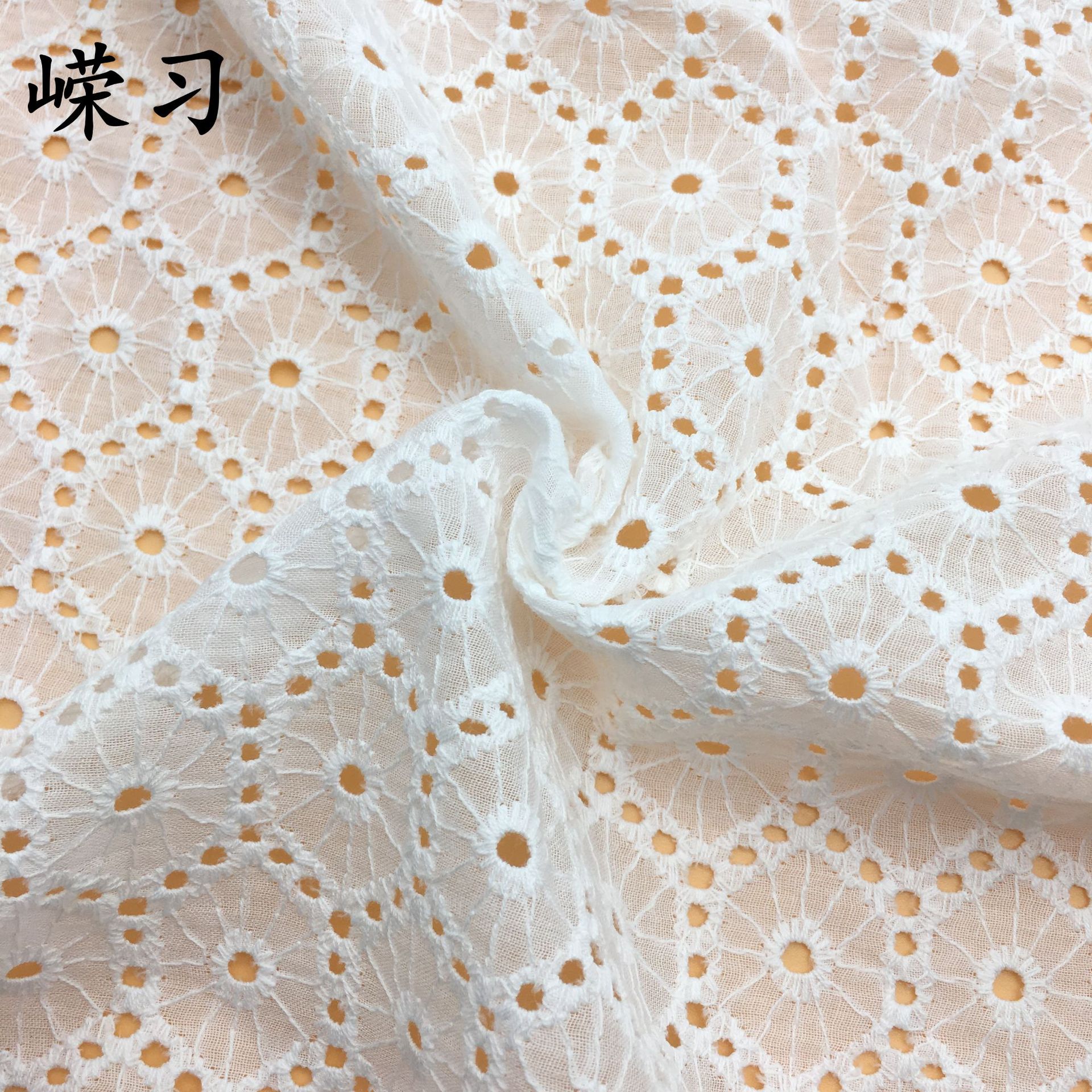 Spring and summer cotton hollow embroidery fabric large machine embroidery geometric fabric table tablecloth dress factory supply