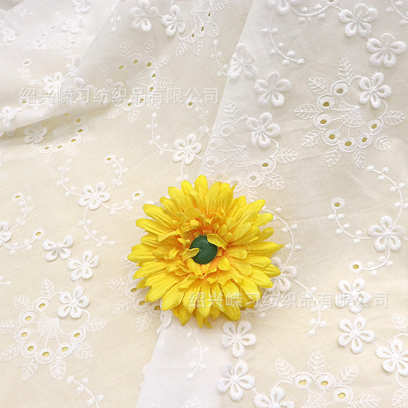 Picture of Factory in stock cotton three-dimensional small flower embroidered cloth women's clothing dress shoes and hats cotton embroidered embroidered fabric