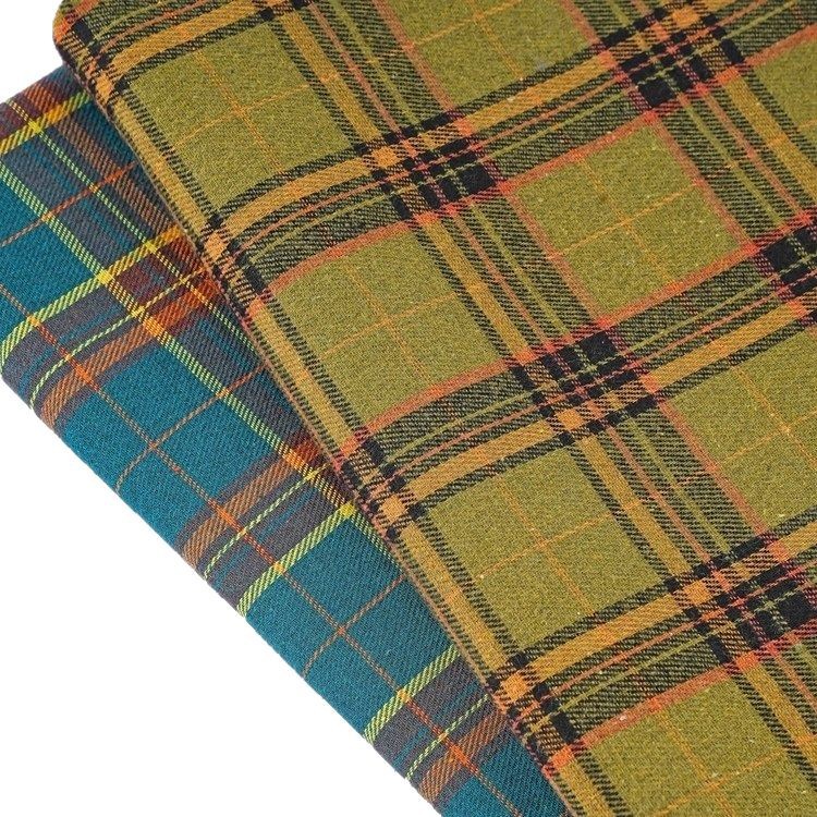 Picture of 140g Yarn-Dyed Plaid Woolen Fabric in Stock Wholesale 21S Yarn-Dyed Twill Brushed Plaid Shirt Fabric Ins Flannel
