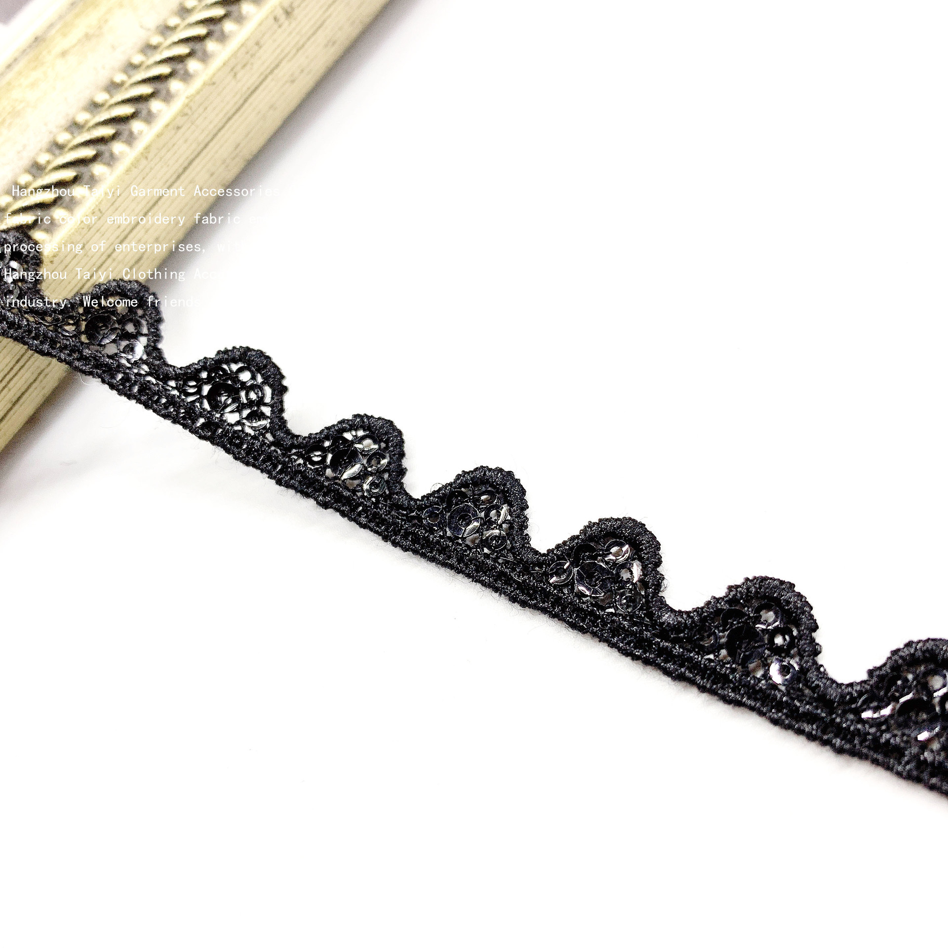 Picture of Unilateral wave lace manufacturers wholesale polyester silk hollow embroidery clothing accessories lace beads bar code lace