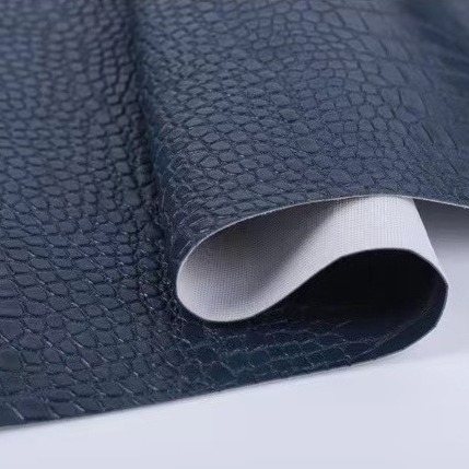 Picture of Factory wholesale spunlace fabric bottom crocodile pattern PVC leather luggage wine box packaging notebook cover artificial leather