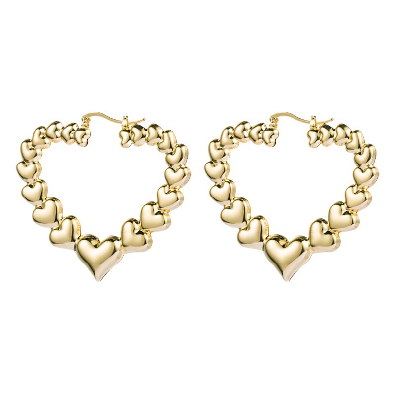 Ins European and American exaggerated hollow retro heart-shaped alloy smooth earrings simple metal texture personality temperament earrings