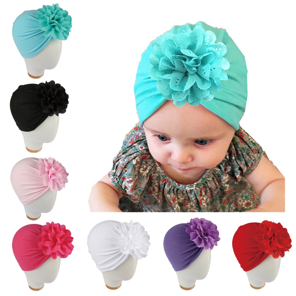 Picture of Autumn and winter New Baby products Children's hat hollow flower knot posmi industry style Indian hat baby hat