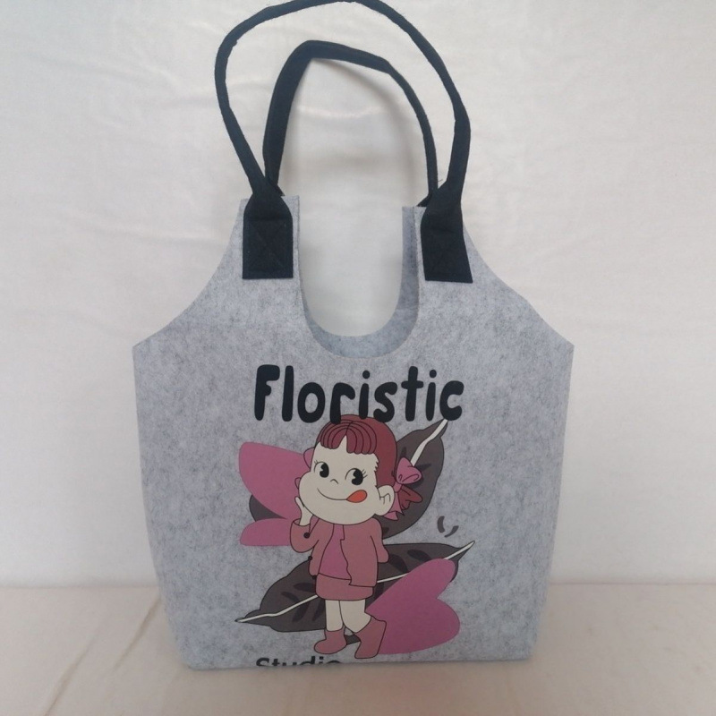 Picture of New Cyber Celebratory Cartoon Student Handbag Super Cute Cartoon Cute Rabbit Felt Bag Full Moon One Year Old Bag Mend-up Bag