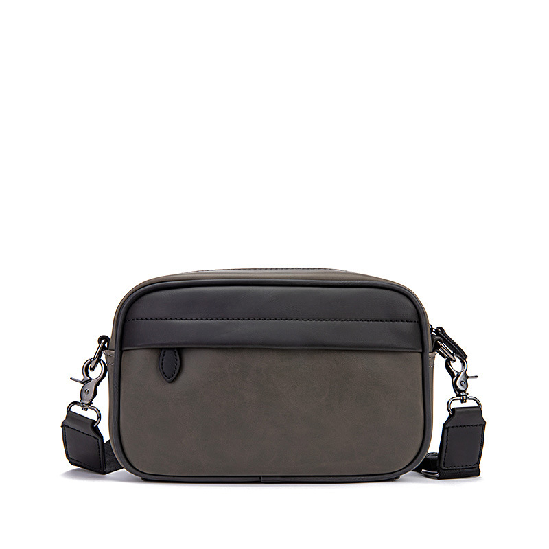 Picture of Korean fashion Men's messenger bag 2024 New retro solid color small backpack casual shoulder phone bag for men