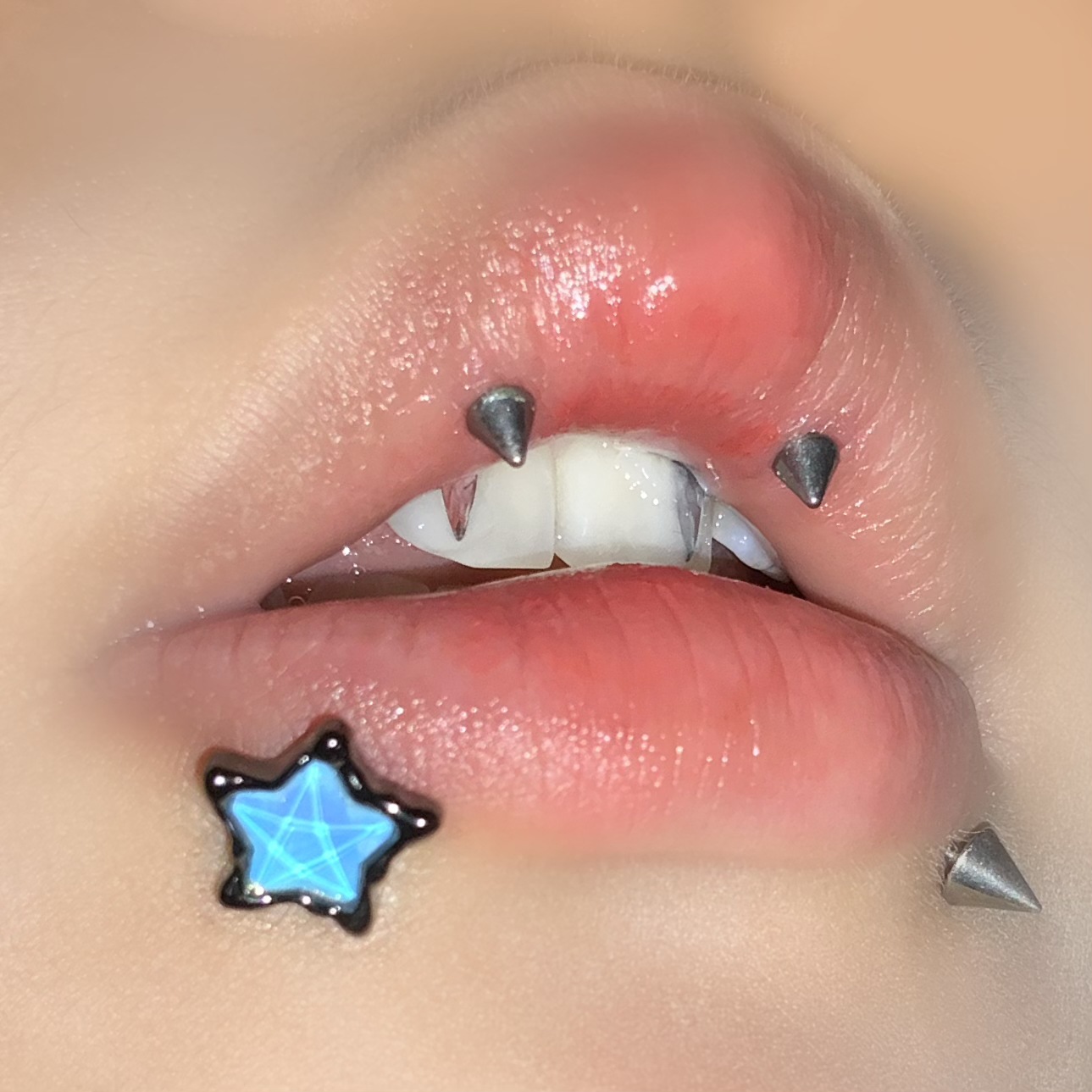Inner teeth colorful five-pointed star star lip nail ear bone nail mocha black steel piercing jewelry cute hot girl Europe and America