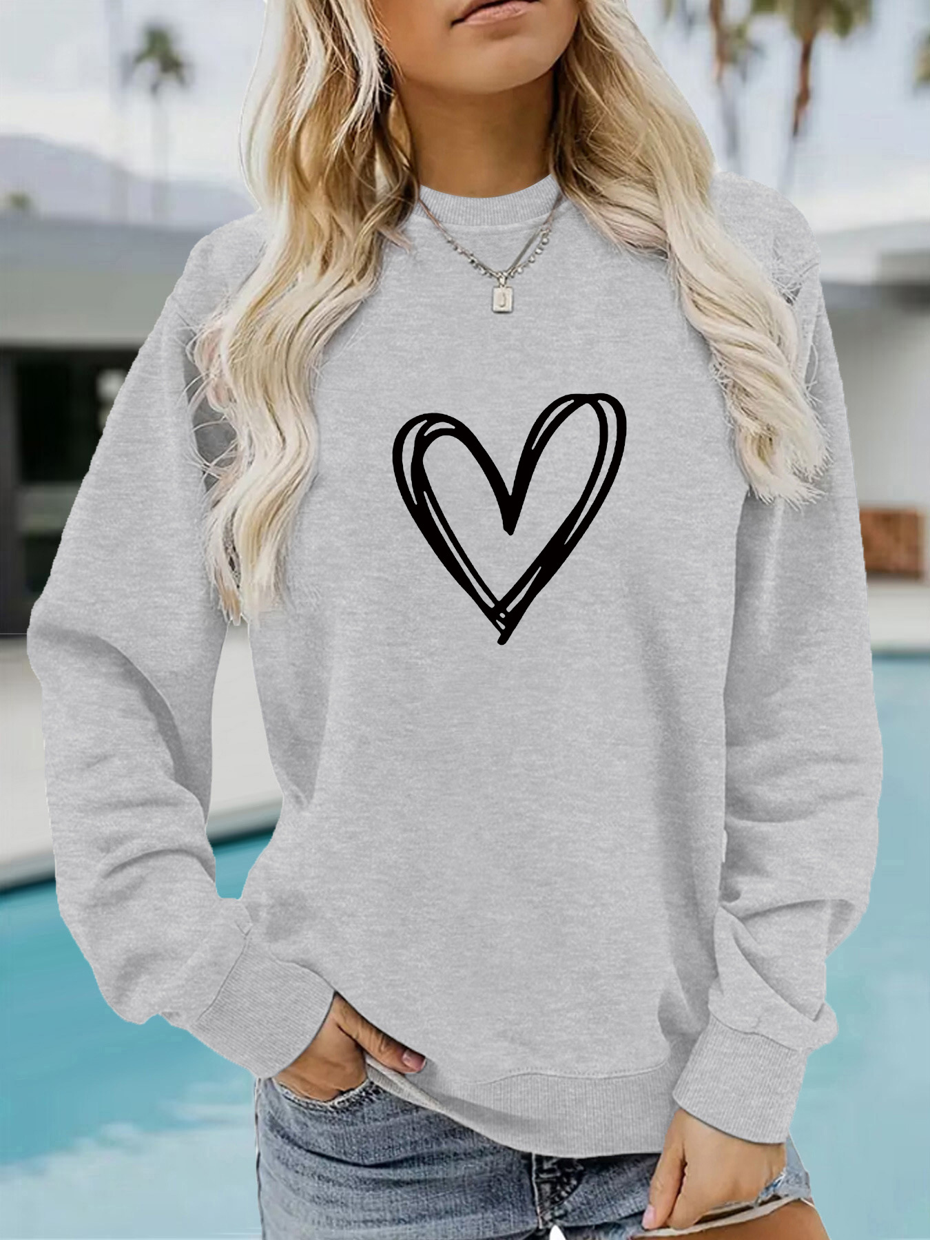 Picture of Europe and the United States cross-border autumn and winter women's casual long sleeve round neck heart-shaped printed pullover sweatshirt sweater wholesale