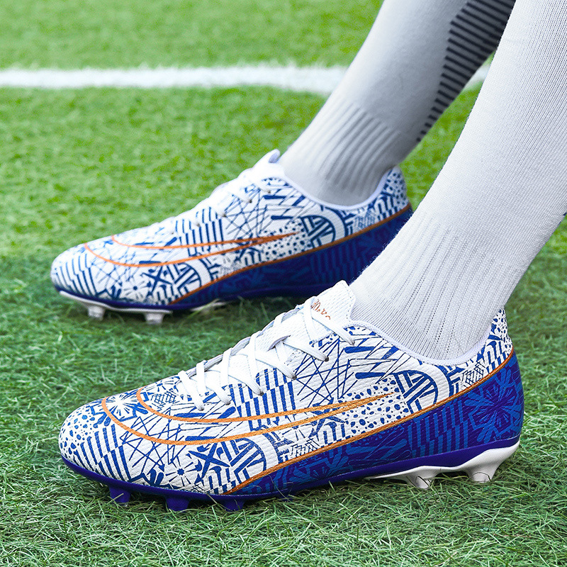 Cross-border foreign trade football shoes men's broken nails primary school students teenagers mandarin duck couple artificial grass spikes training wholesale