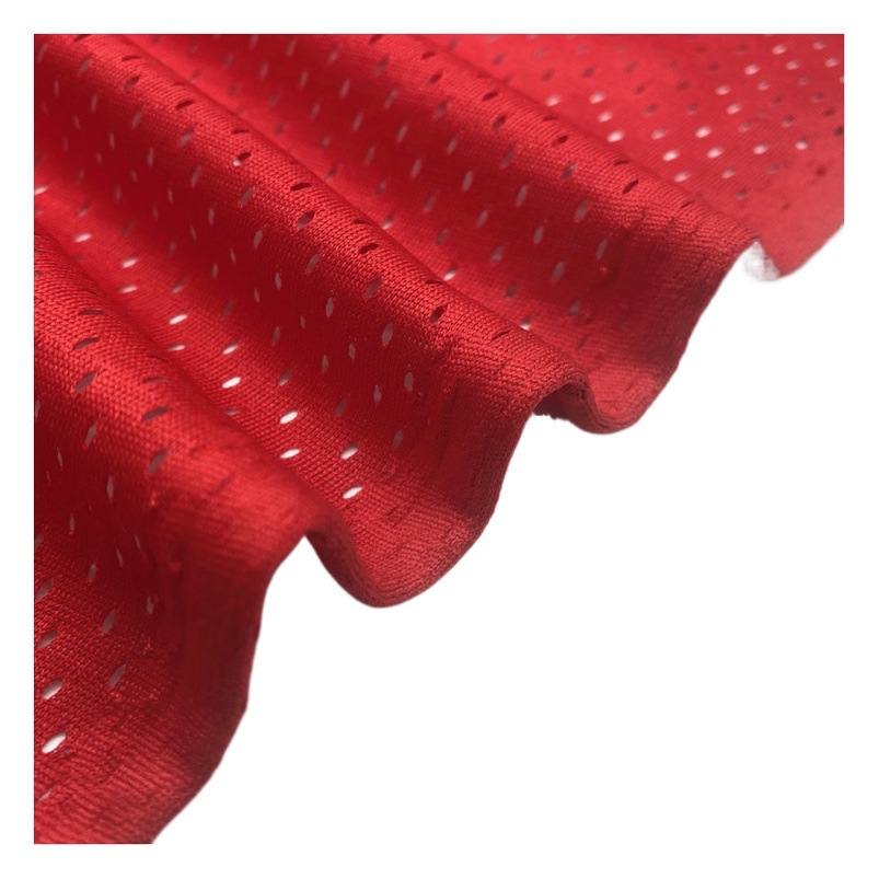 Spot 100D low elastic hole cloth 150g leisure ball vest vest beach pants polyester knitted mesh fabric