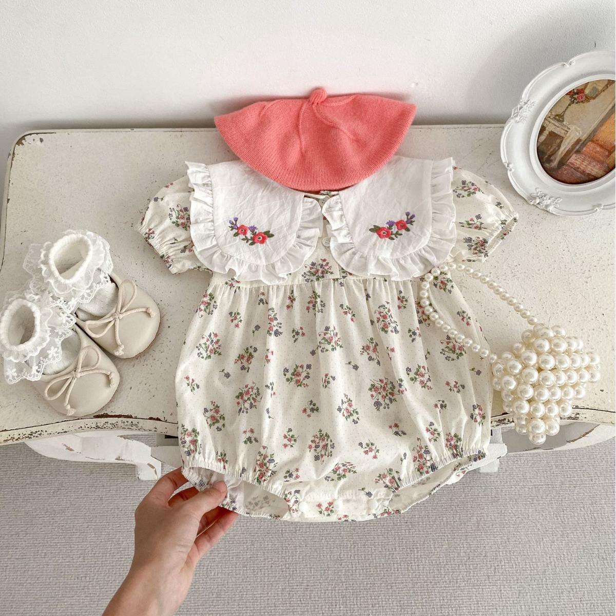 Picture of 2025 Western Style Baby Summer Jumpsuit Floral Triangle Hoodie Embroidered Large Lapel Short-Sleeved Baby Girl