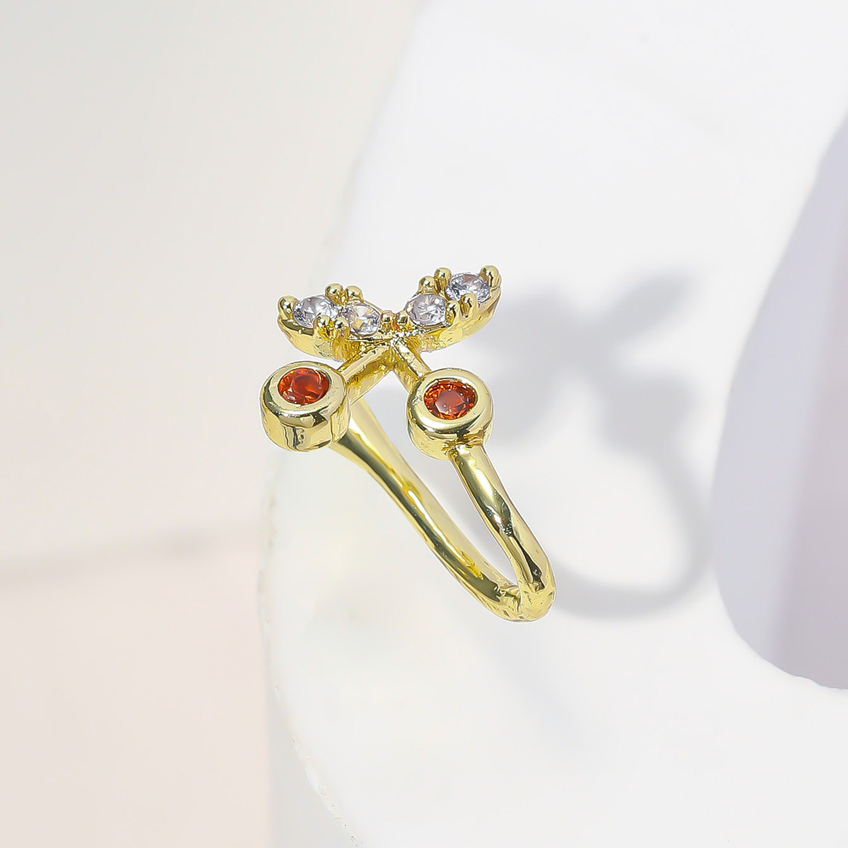 Picture of A copper-inlaid stone-free piercing clip-on nose ring Zirconium cherry nose clip nose ornament false nose ring