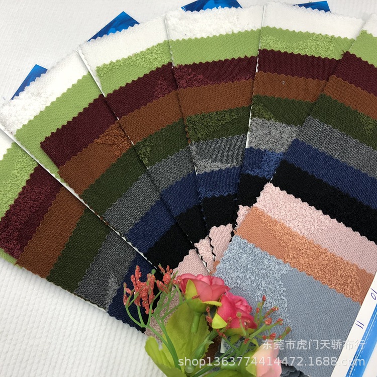 Spot supply of knitted TR stretch burnt jacquard fabric 185 grams of knitted TR five-pointed star random flower knitted jacquard