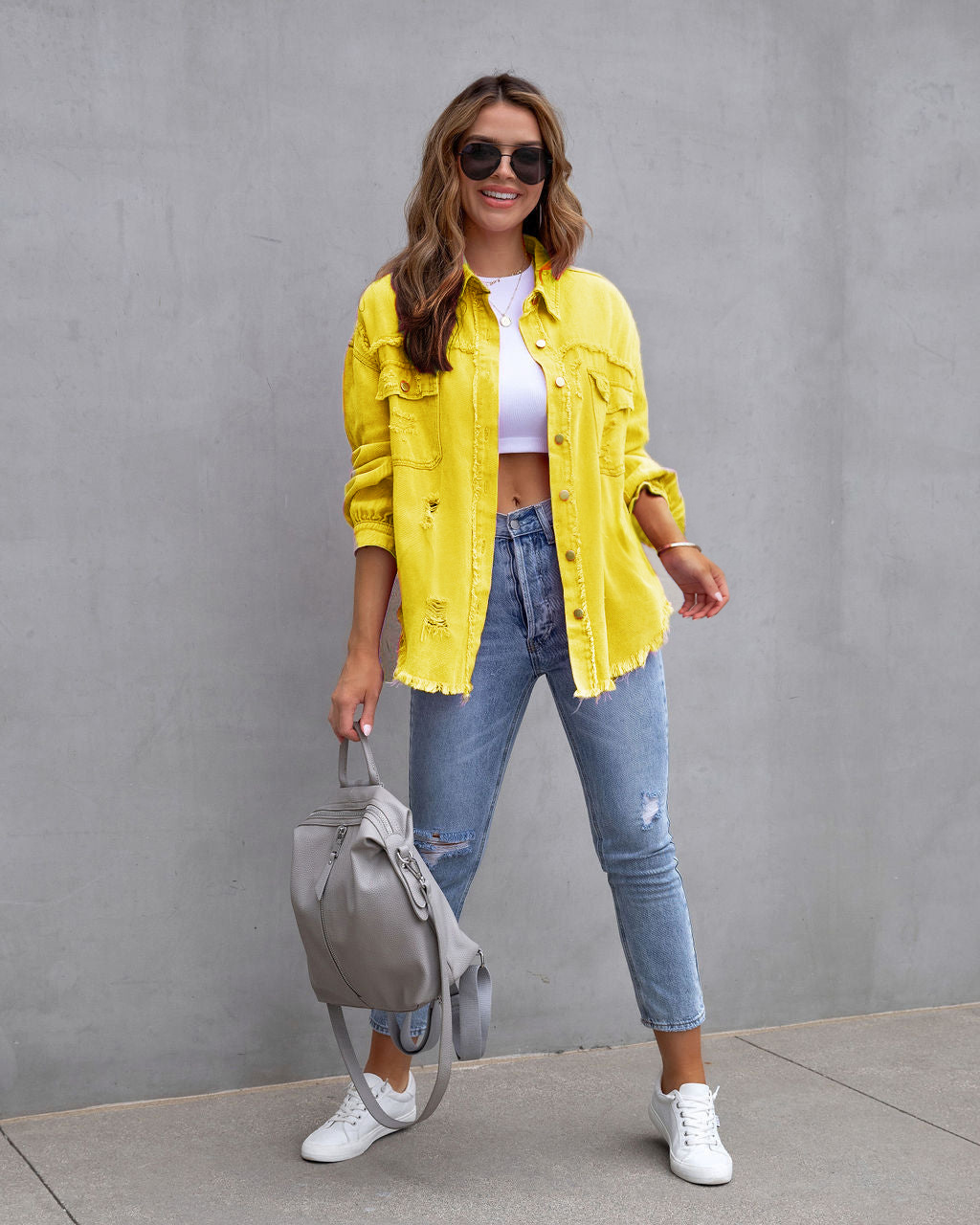 Picture of 2025 New European and American Style Mid-Length Raw Edge Ripped Denim Jacket Women's Autumn and Winter Long-Sleeved Casual Lapel Top