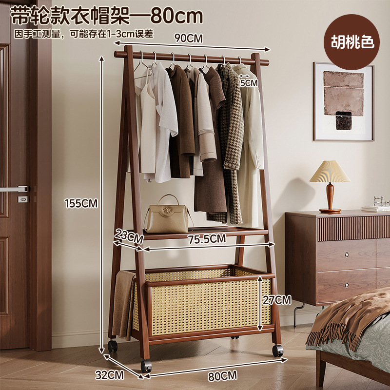 Picture of Vertical hanger floor simple coat rack rack for hanging clothes in a home room is foldable and durable drying rack