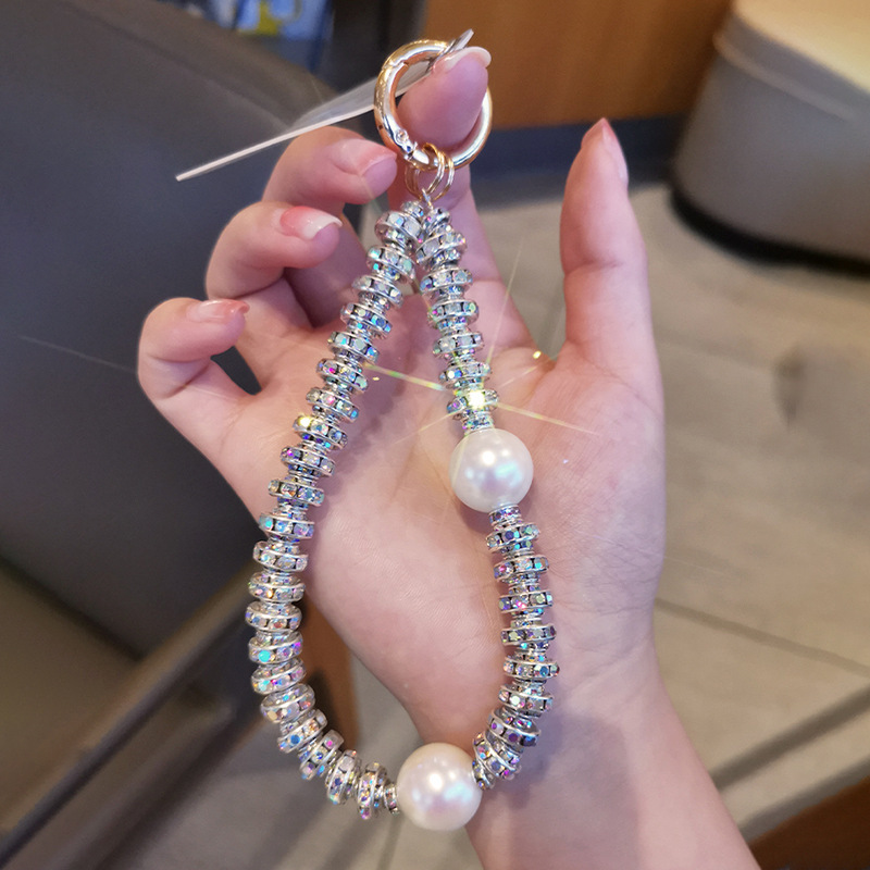 A generation of mobile phone chain pendant rhinestone creative rope Joker shell chain pendant portable luxury high sense chain