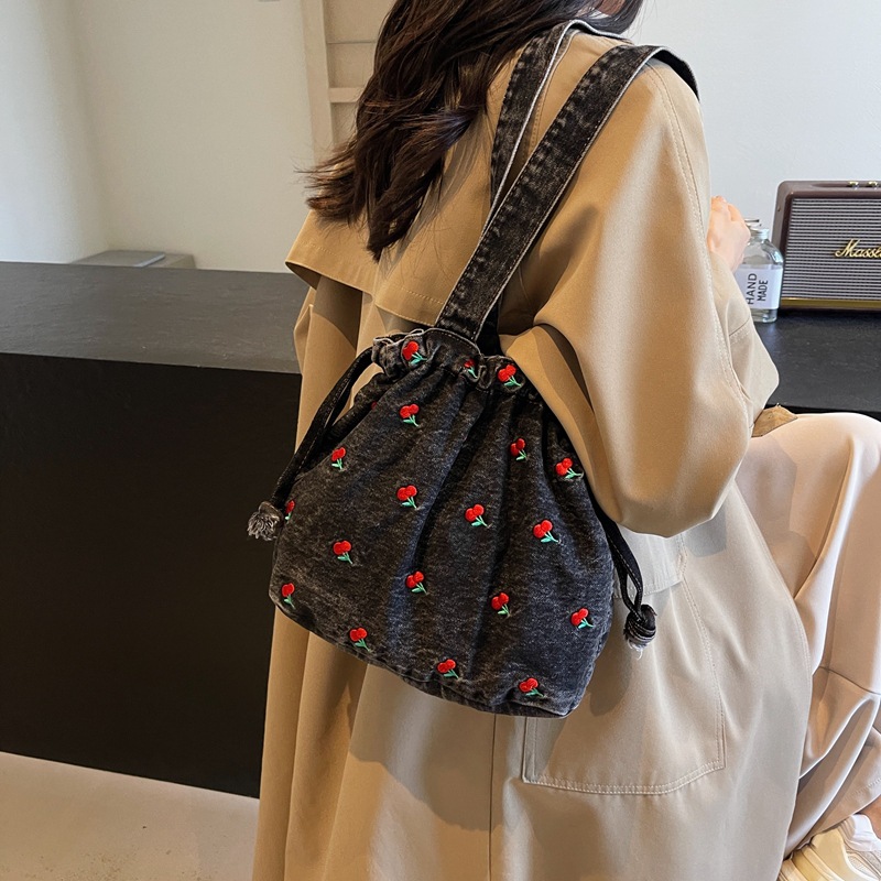 Picture of Foreign Order 2025 New Denim Bucket Bag Large Capacity Women's Bag Niche Design Shoulder Bag High-End Armpit Bag Trendy