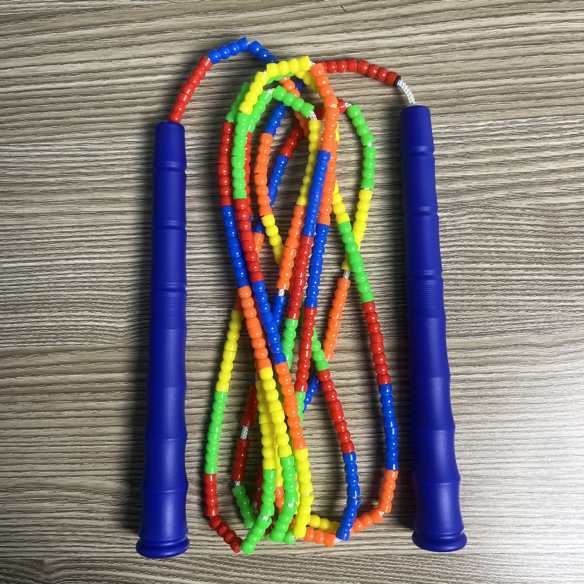 Picture of Manufacturer Wholesale Children's Fitness Sports Pattern Skipping Rope Kindergarten Competition Soft Bead Bamboo Skipping Rope for Primary School Students