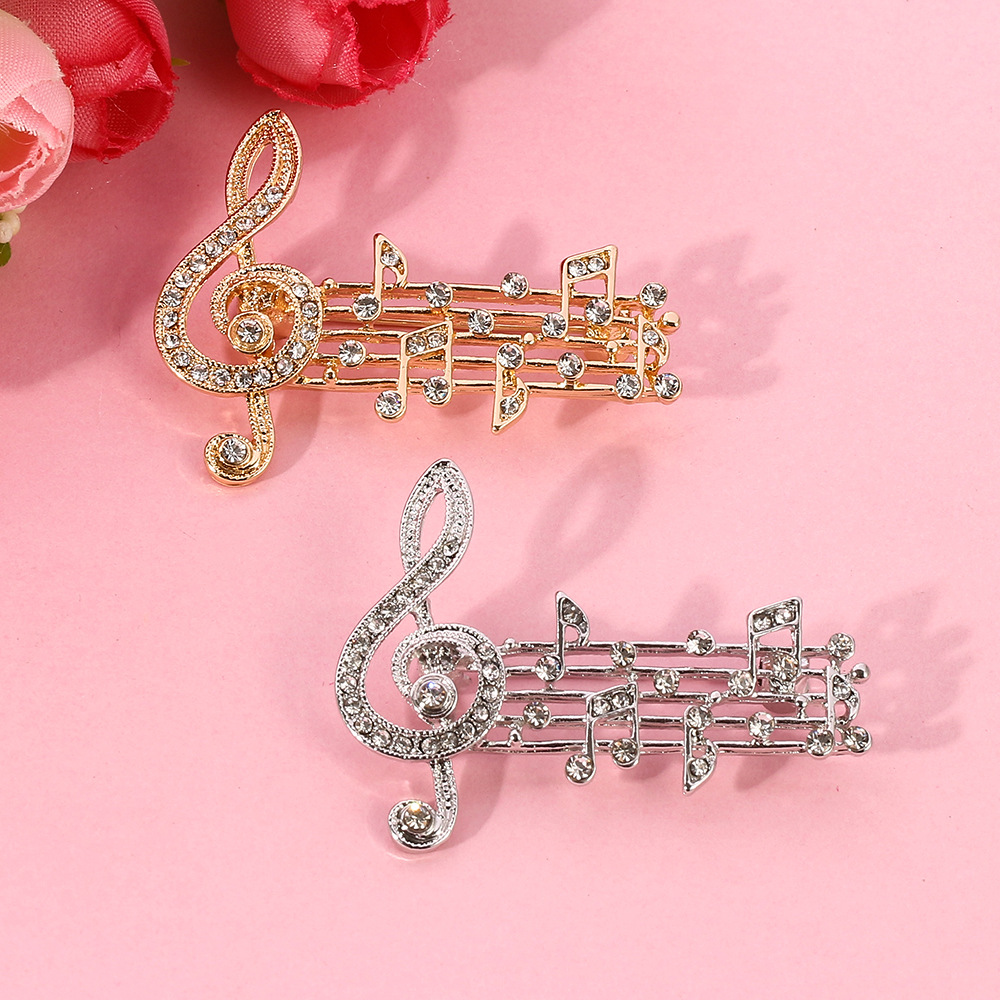 Picture of Elegant musical note music rhythm brooch inlaid with full diamond beating note pin bag clothes accessories spot