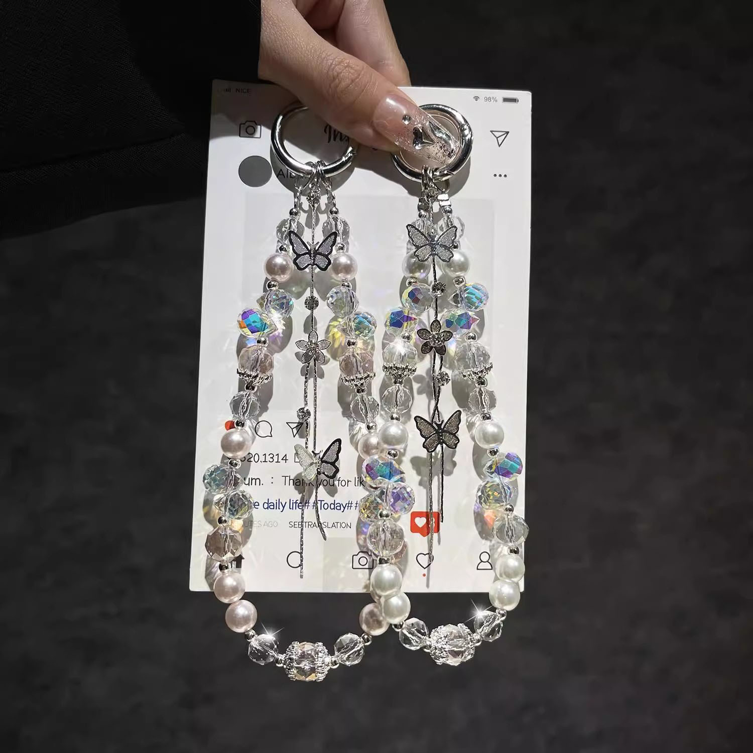 Butterfly tassel pearl crystal mobile phone chain lanyard new portable chain short female universal camera pendant lanyard