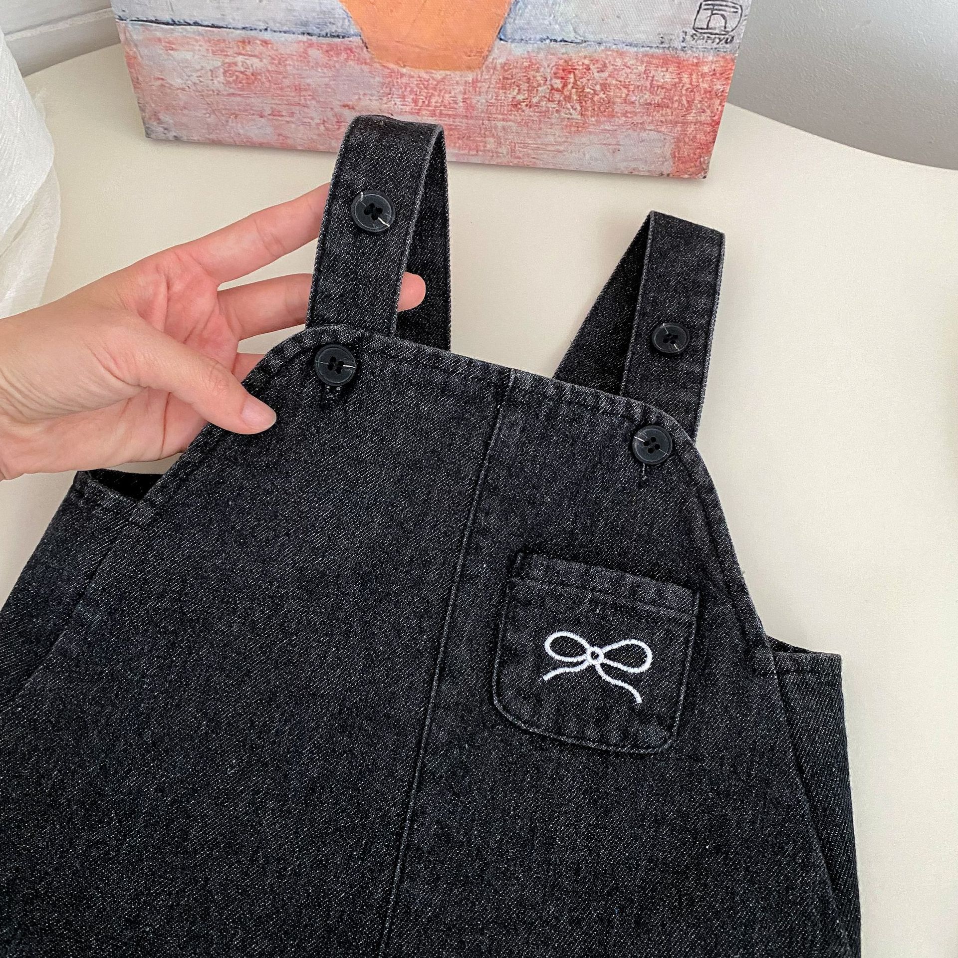Picture of 2025 Spring Girls Denim dress New All-match Bow Strap Denim Skirt Lapel Base Two-piece Set