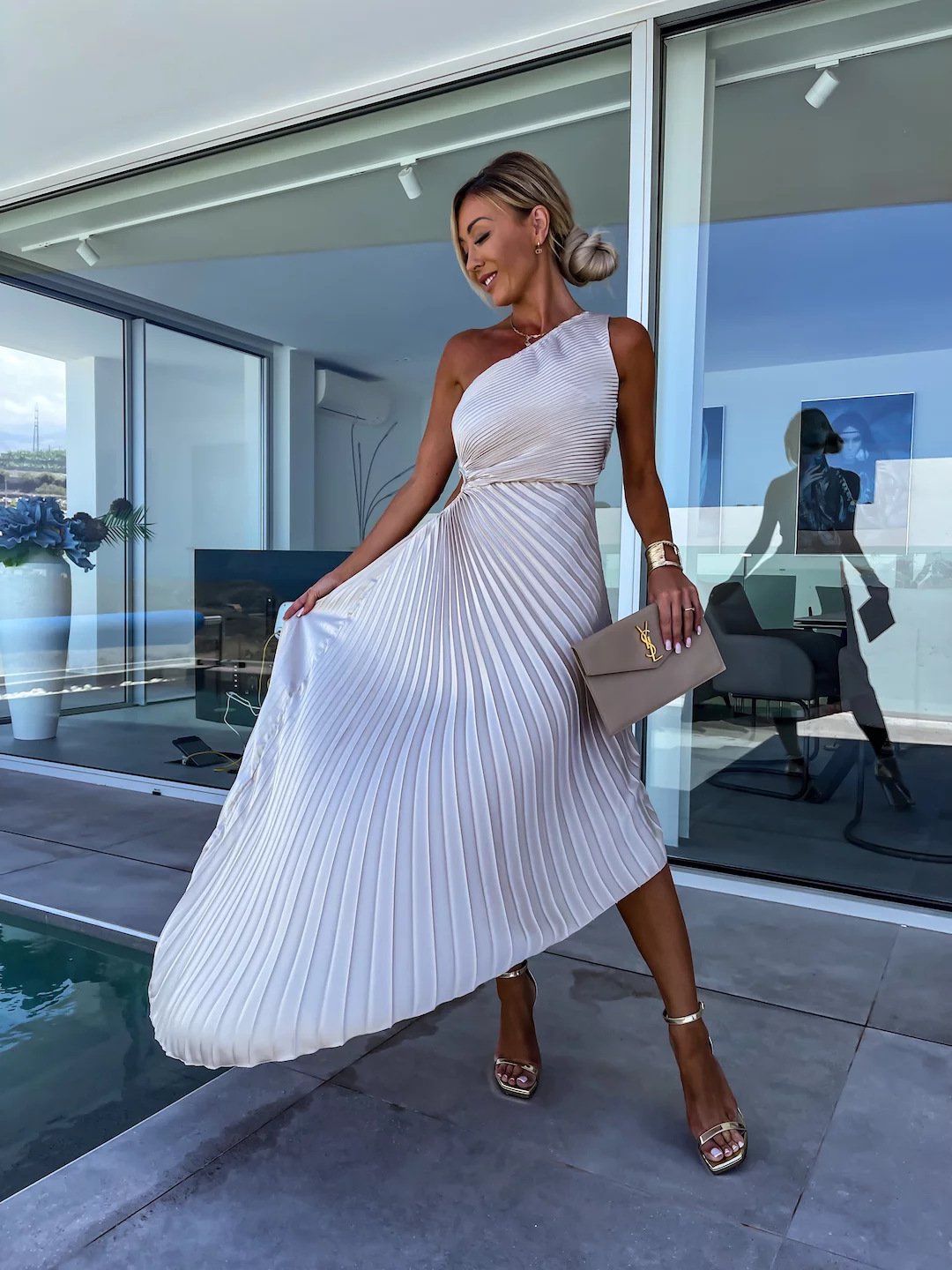 Picture of European and American 2024 Women's New Fashion Solid Color Casual Sexy Elegant One-shoulder Oblique Collar Pleated Hollow Dress